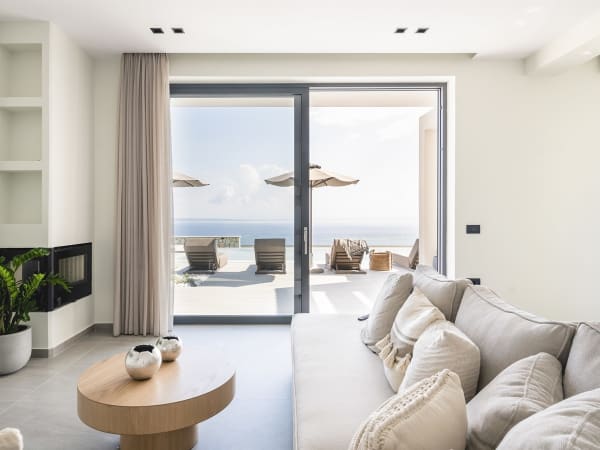 The ground floor living area with its sea views and terrace access.